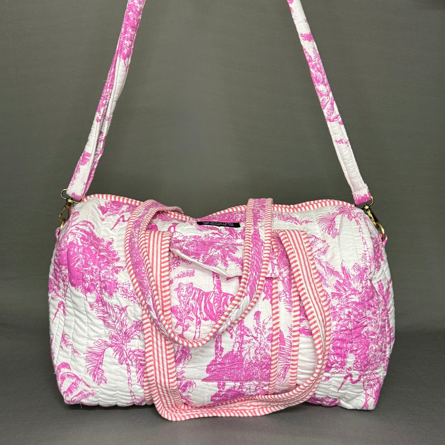 Jaipur Jungle print bright Pink color cotton quilted Duffle bag