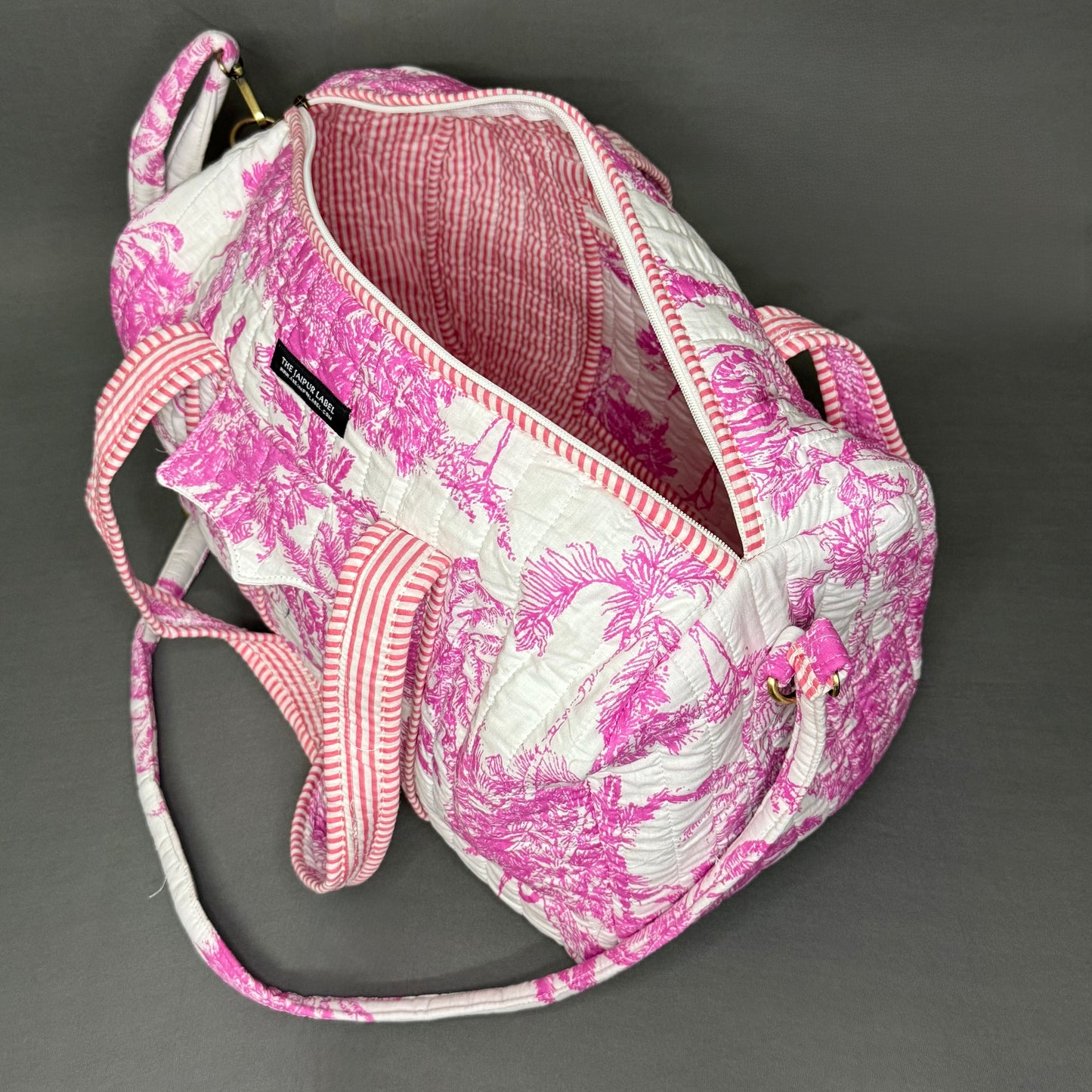 Jaipur Jungle print bright Pink color cotton quilted Duffle bag