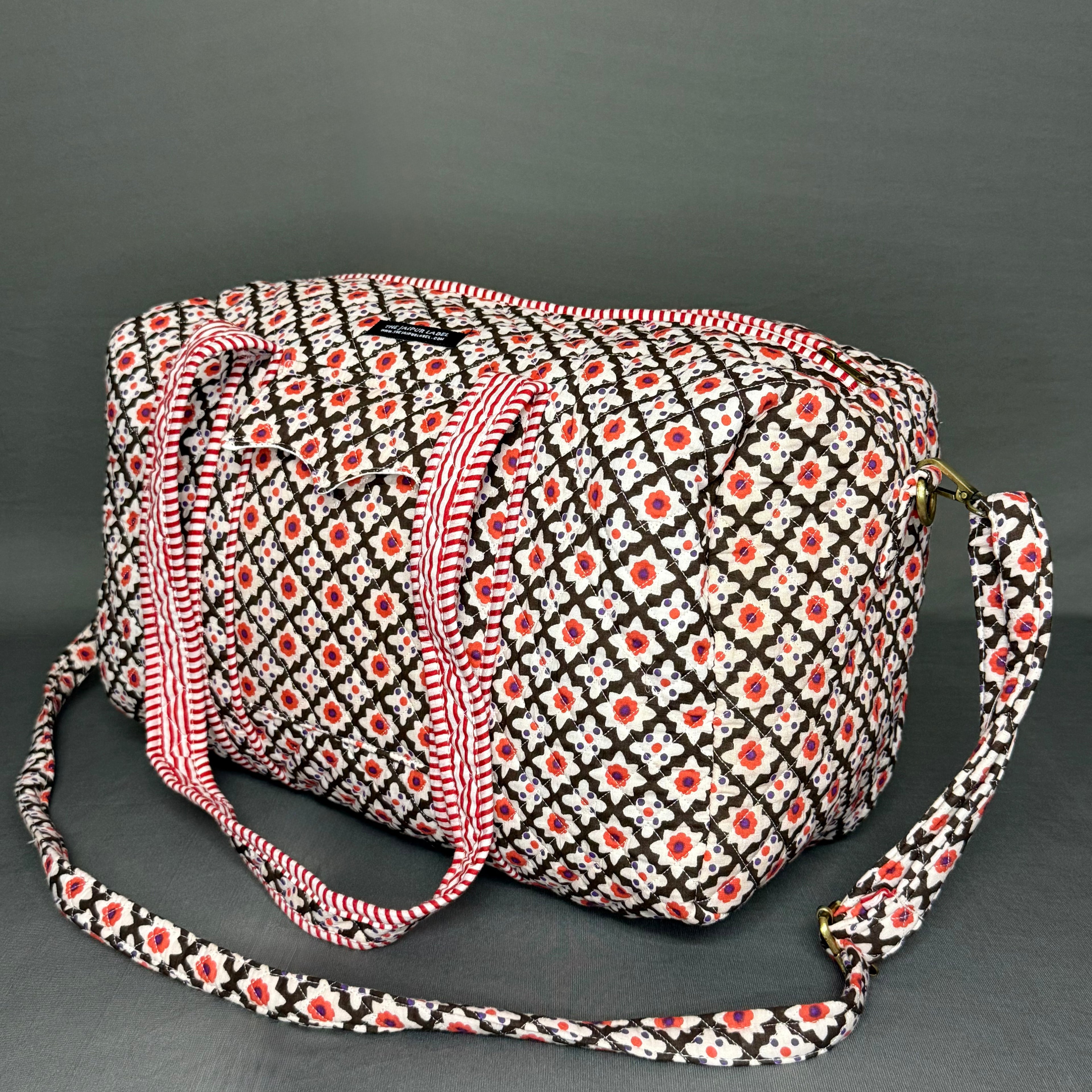 Black & Red White Floral Print Designer Pure Cotton Duffle bag